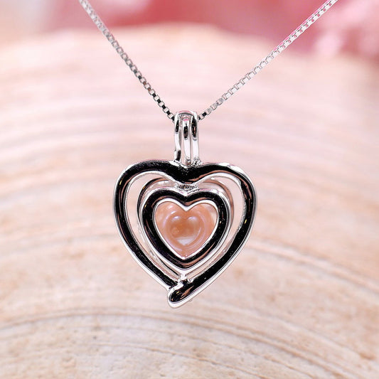 Beating Heart Sterling Silver cage pendant PREORDER